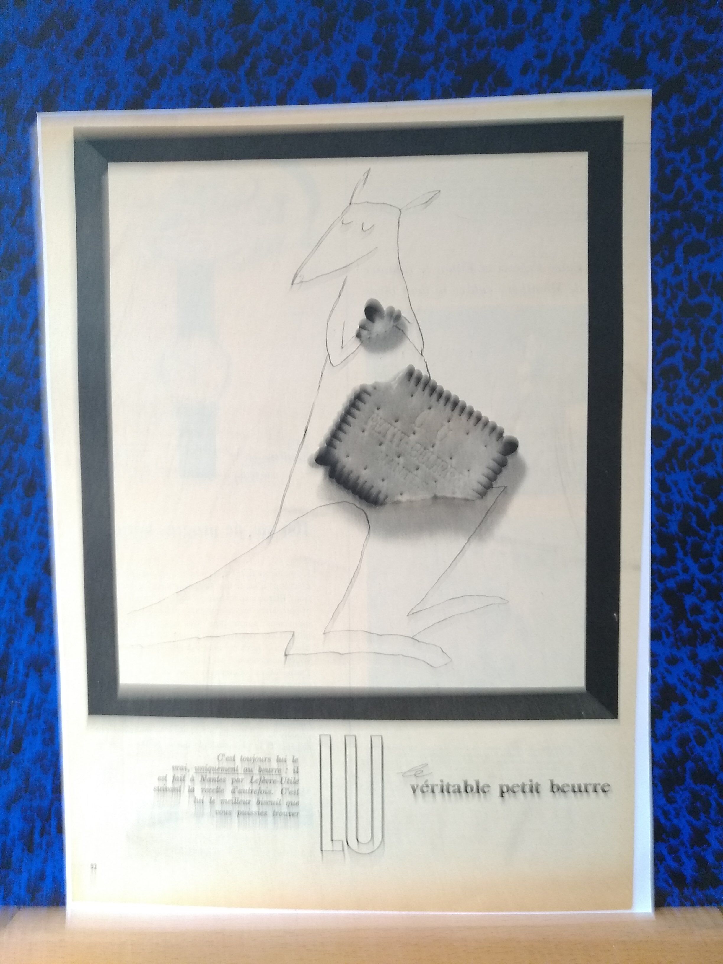 a set of 3 paper advertisements: Petit Lu brand from period reviews