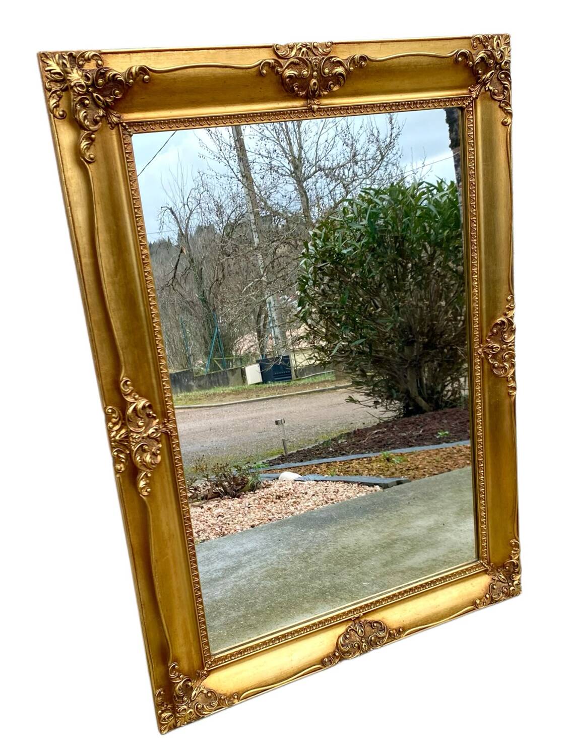 Miroir biseauté en bois doré
