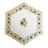 Hand-painted flat dish decorated in the Moustier style.