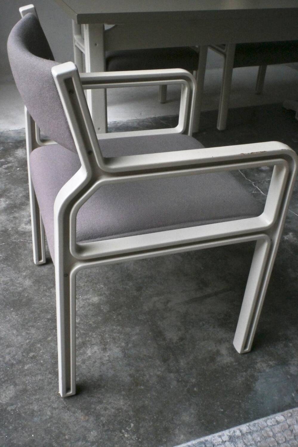 Dining table set and 4 dining chairs by Pierre Mennen for Pastoe.