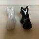 Salt and pepper black and white dogs.