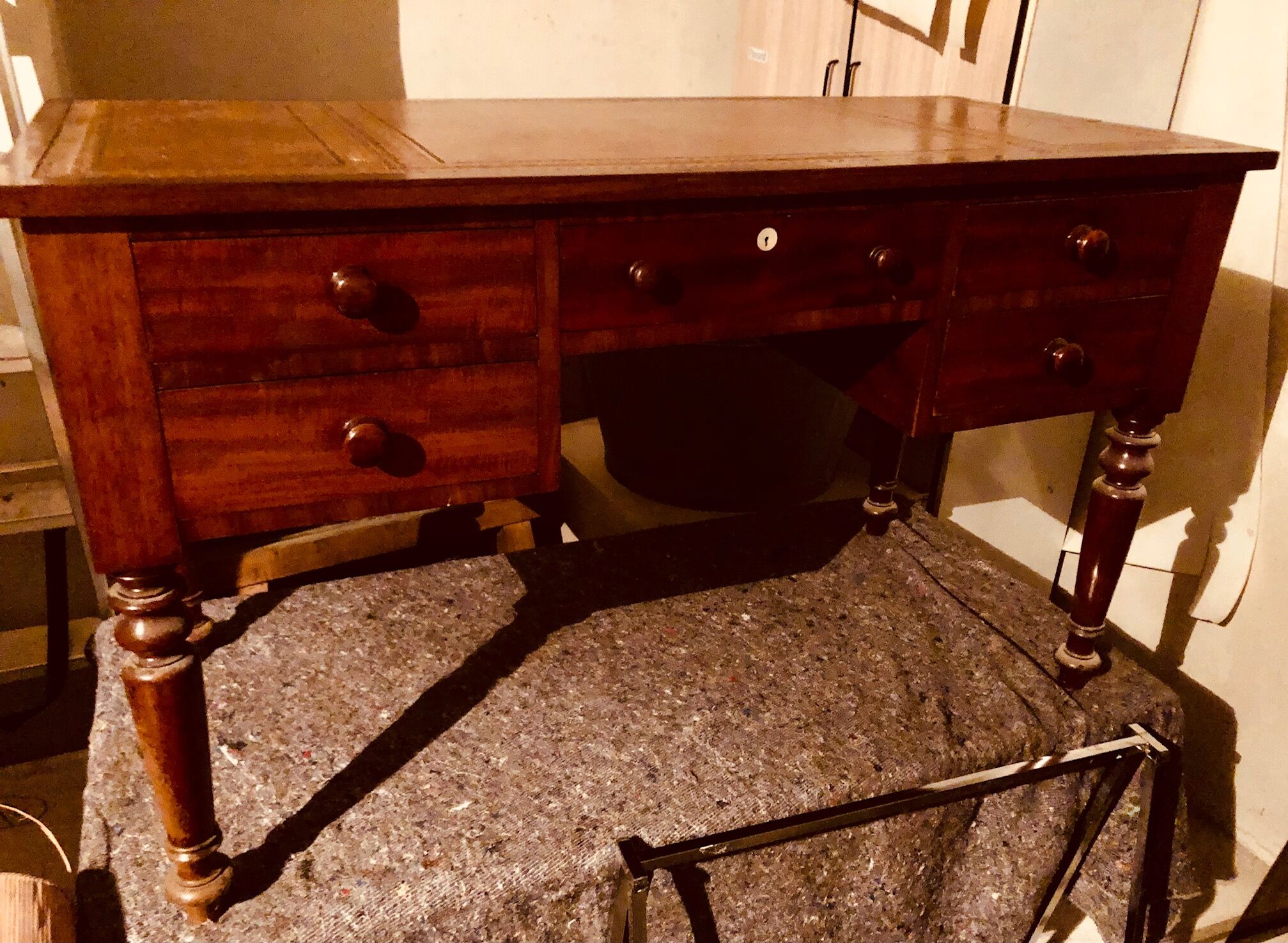 Antique mahogany desk with leather top