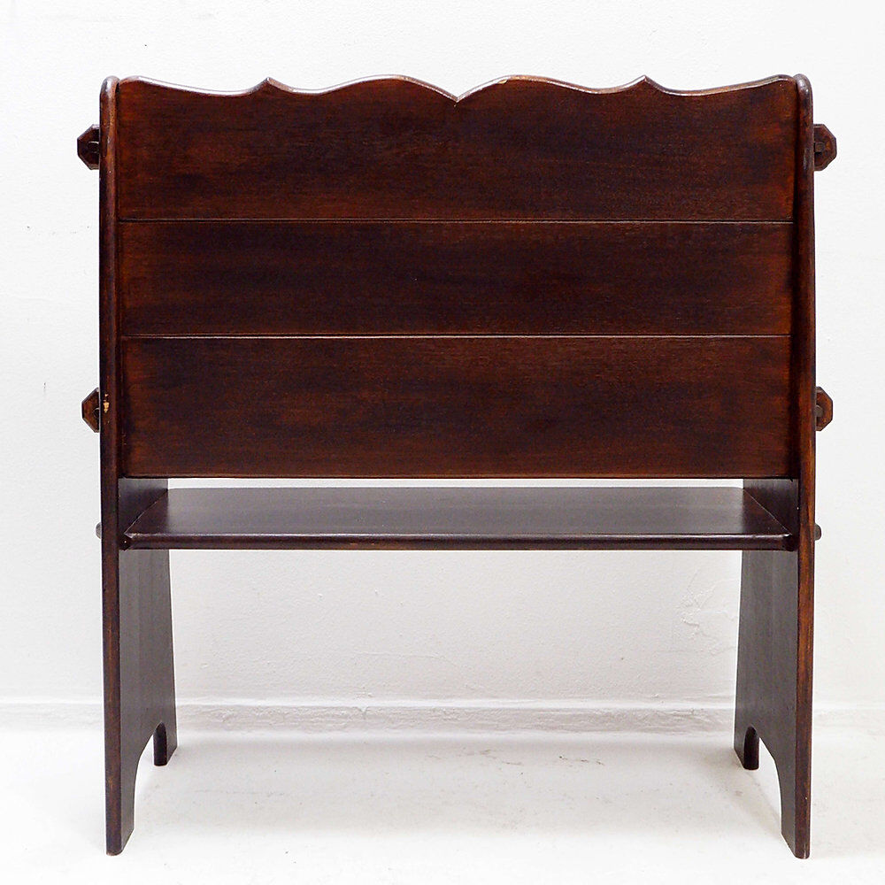 Vintage solid wood church bench from the 20th century.
