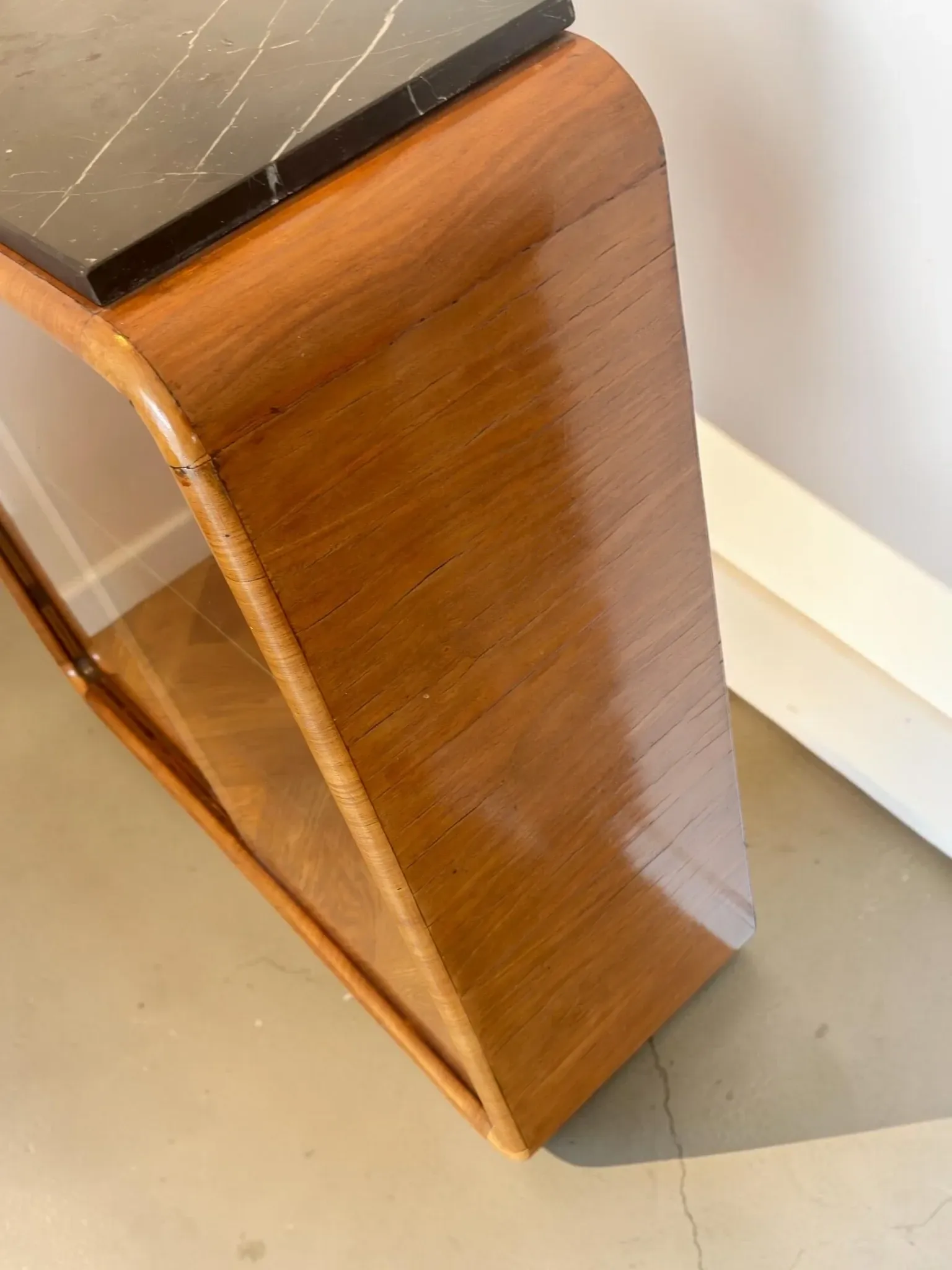 Vintage Art Deco display cabinet in mahogany with a black marble top.