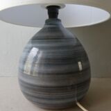 Blue enamelled sandstone lamp, signed