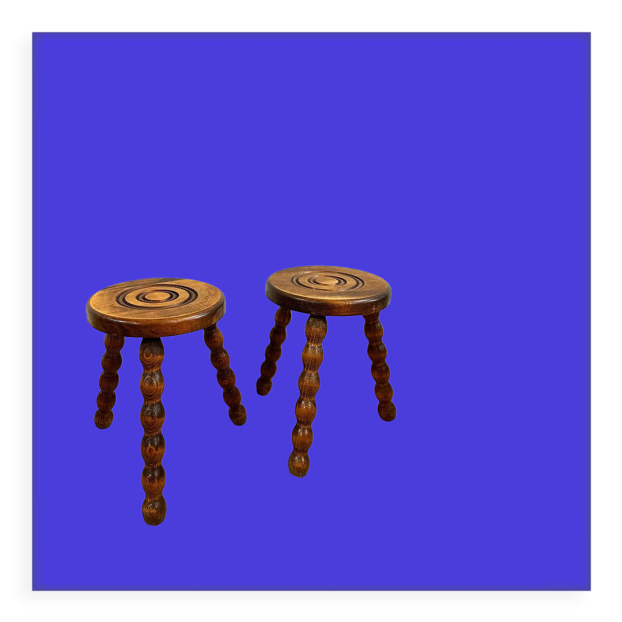Pair of rustic tripod stools