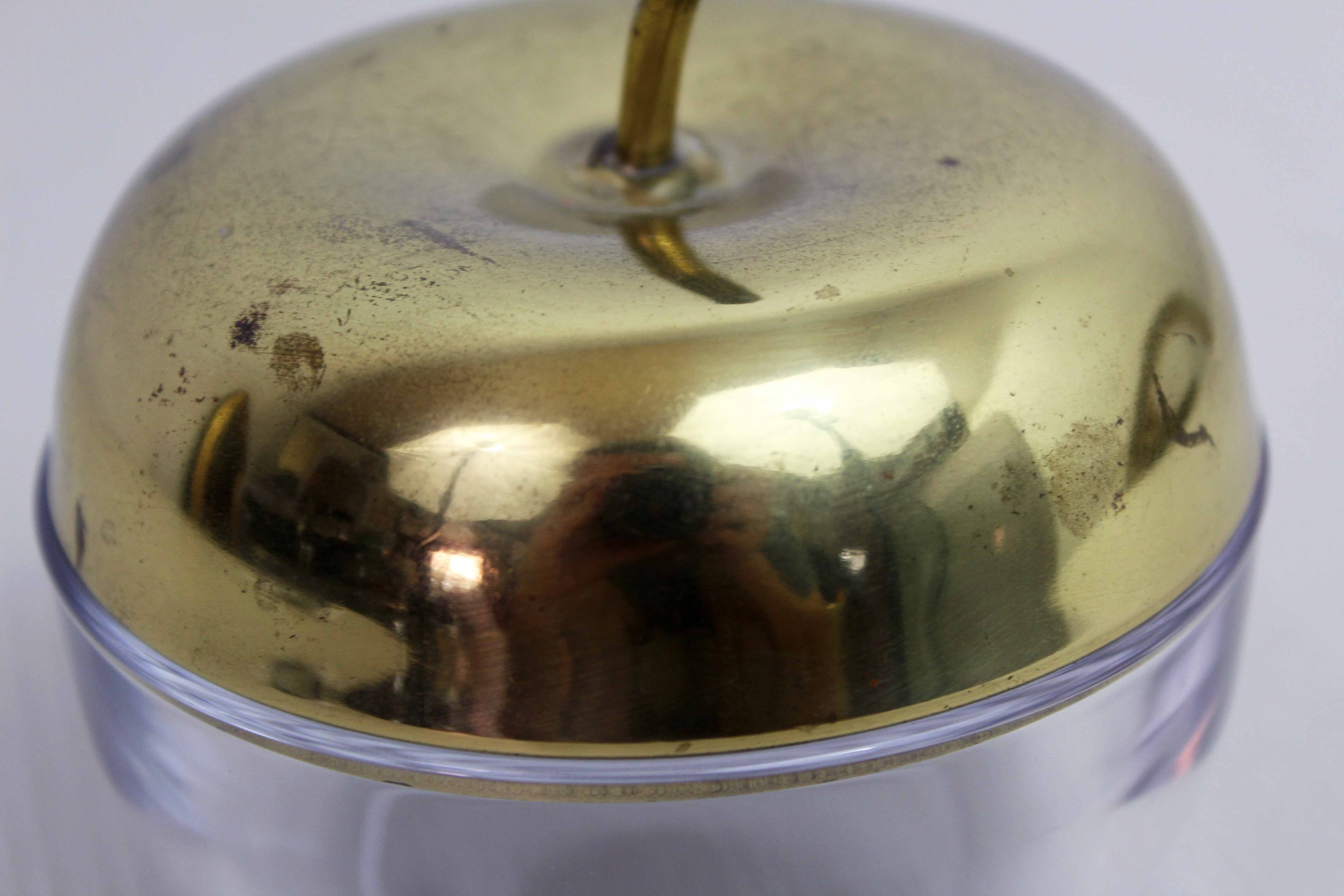 Glass and brass apple sweetener