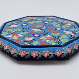 A flat bottom and two enamel bottle bottoms of Longwy