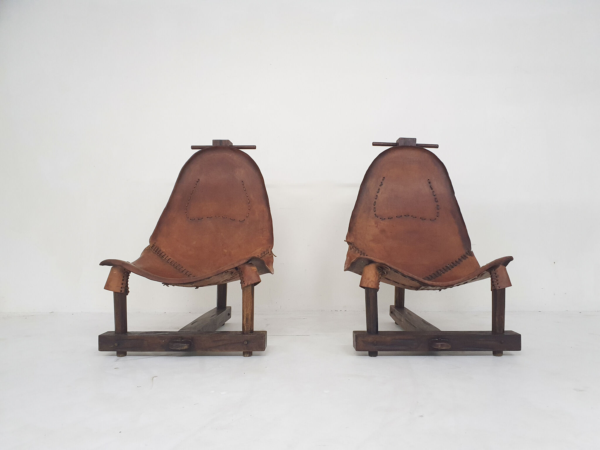 Set of two saddle leather lounge chairs, Brazil, 1960's