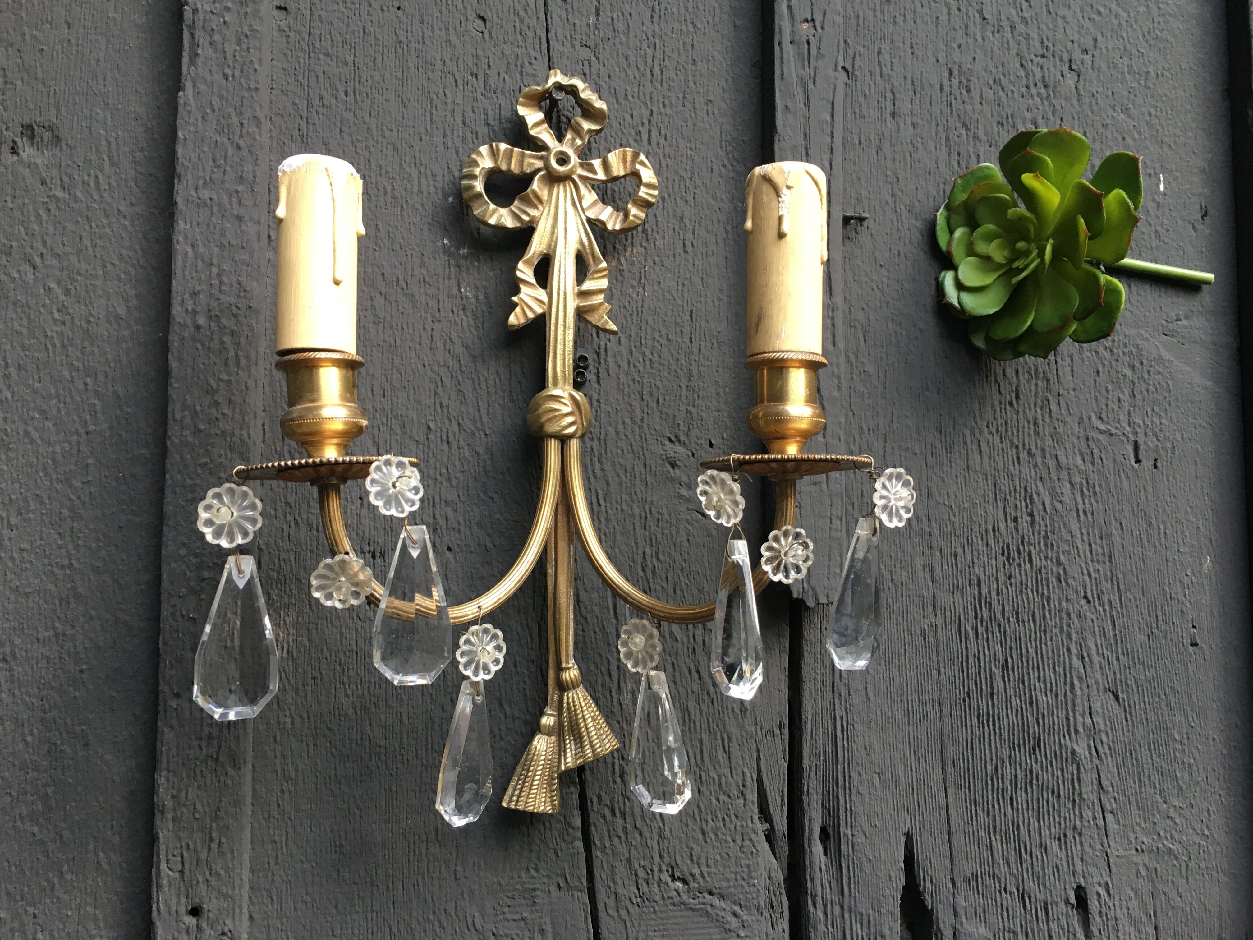 Paire d'appliques en bronze et pampilles