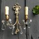 Paire d'appliques en bronze et pampilles