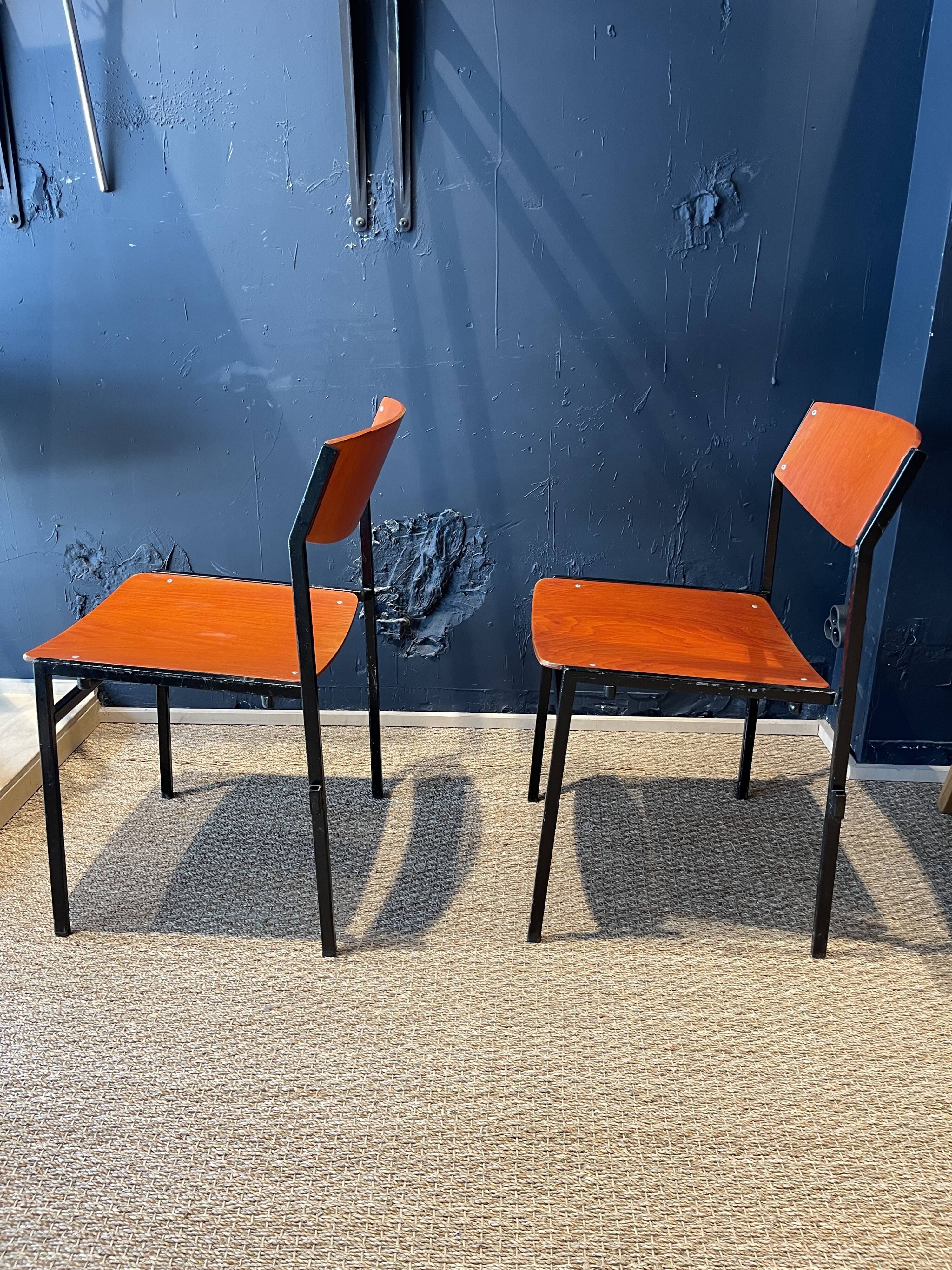 Pair of Gijs Van Der Sluis chairs in orange wood with black legs, Netherlands