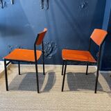 Pair of Gijs Van Der Sluis chairs in orange wood with black legs, Netherlands