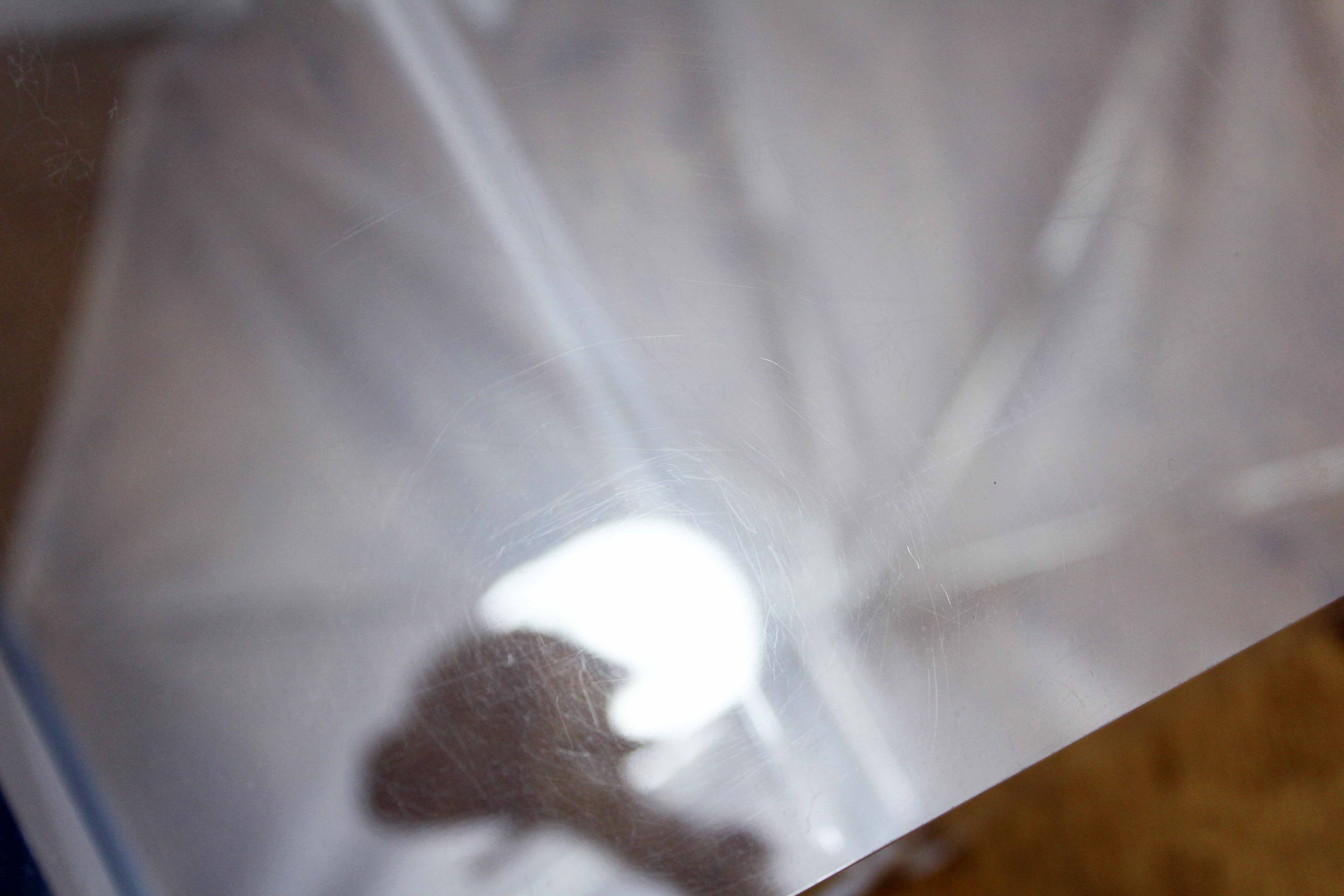 Plexiglas sofa end magazine holder