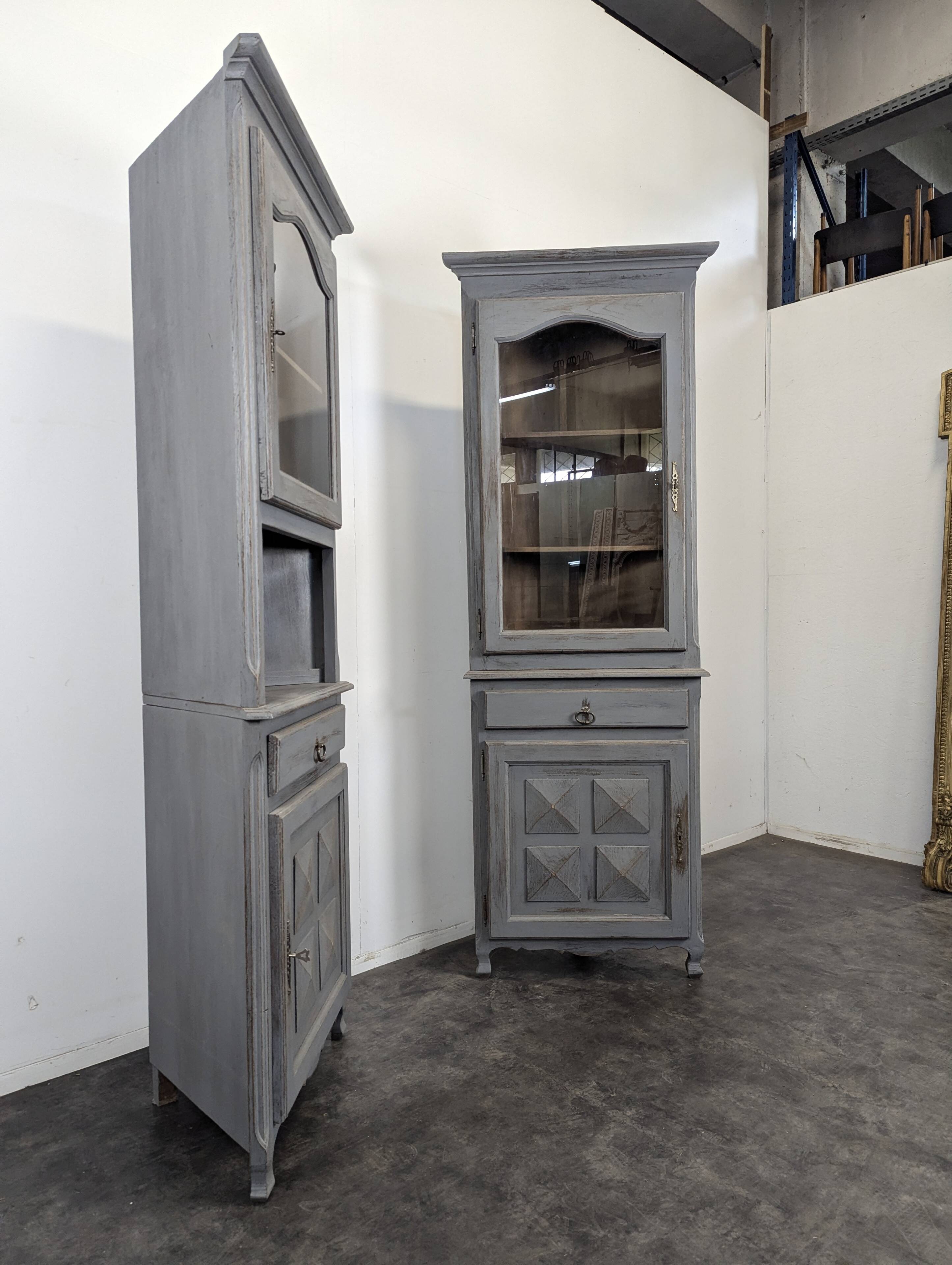 Pair of re-edged corner cabinets