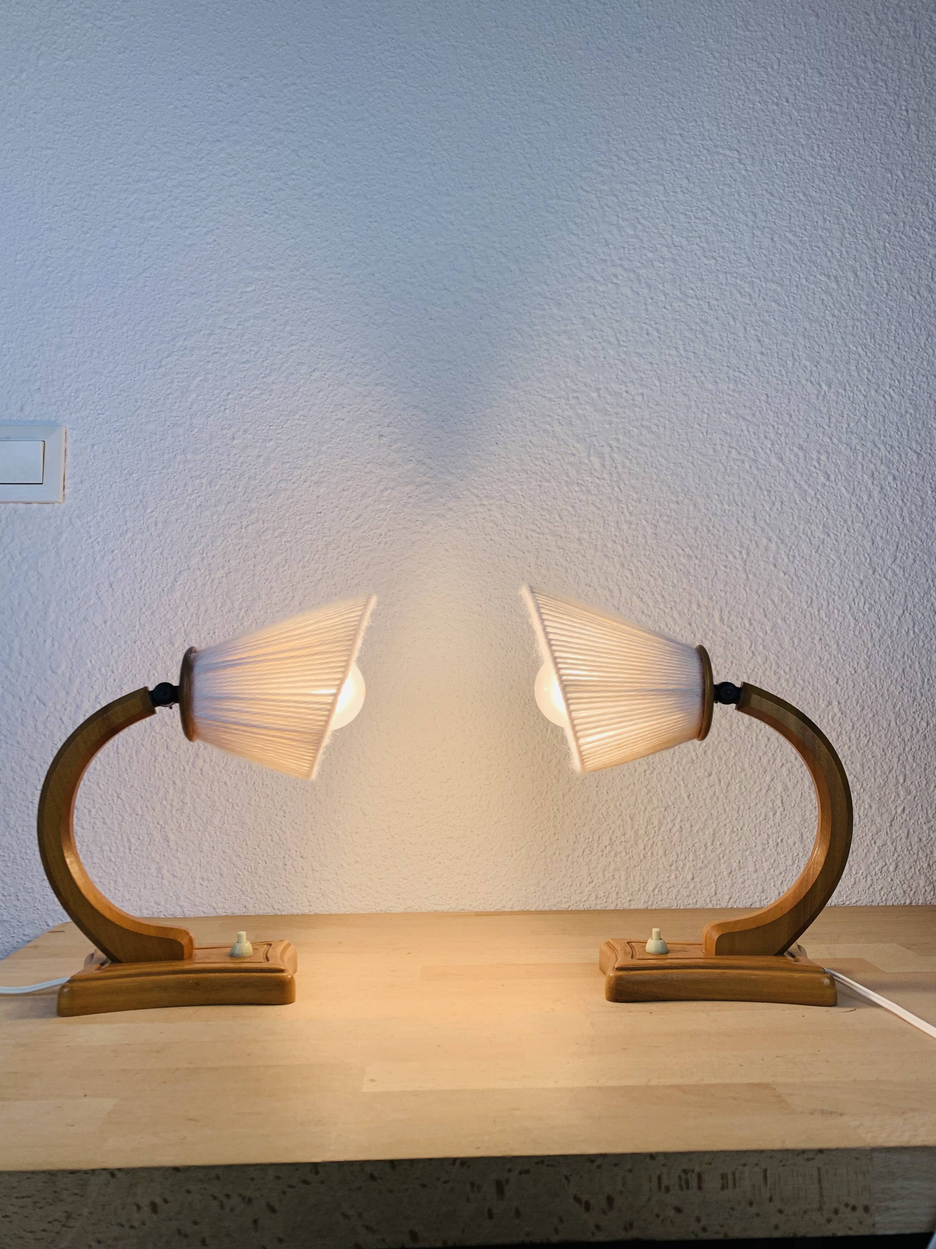 Pair of art deco lamps in curved wood and wool