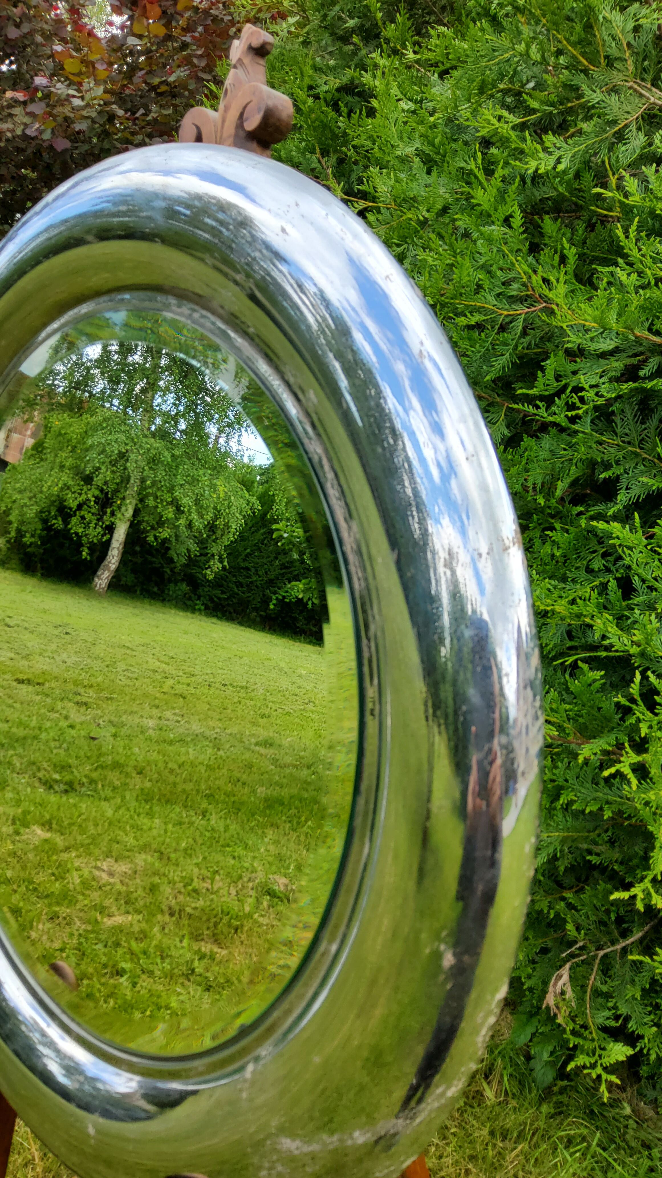 Round mirror of the 70s chromed by Reggiani Lampadari