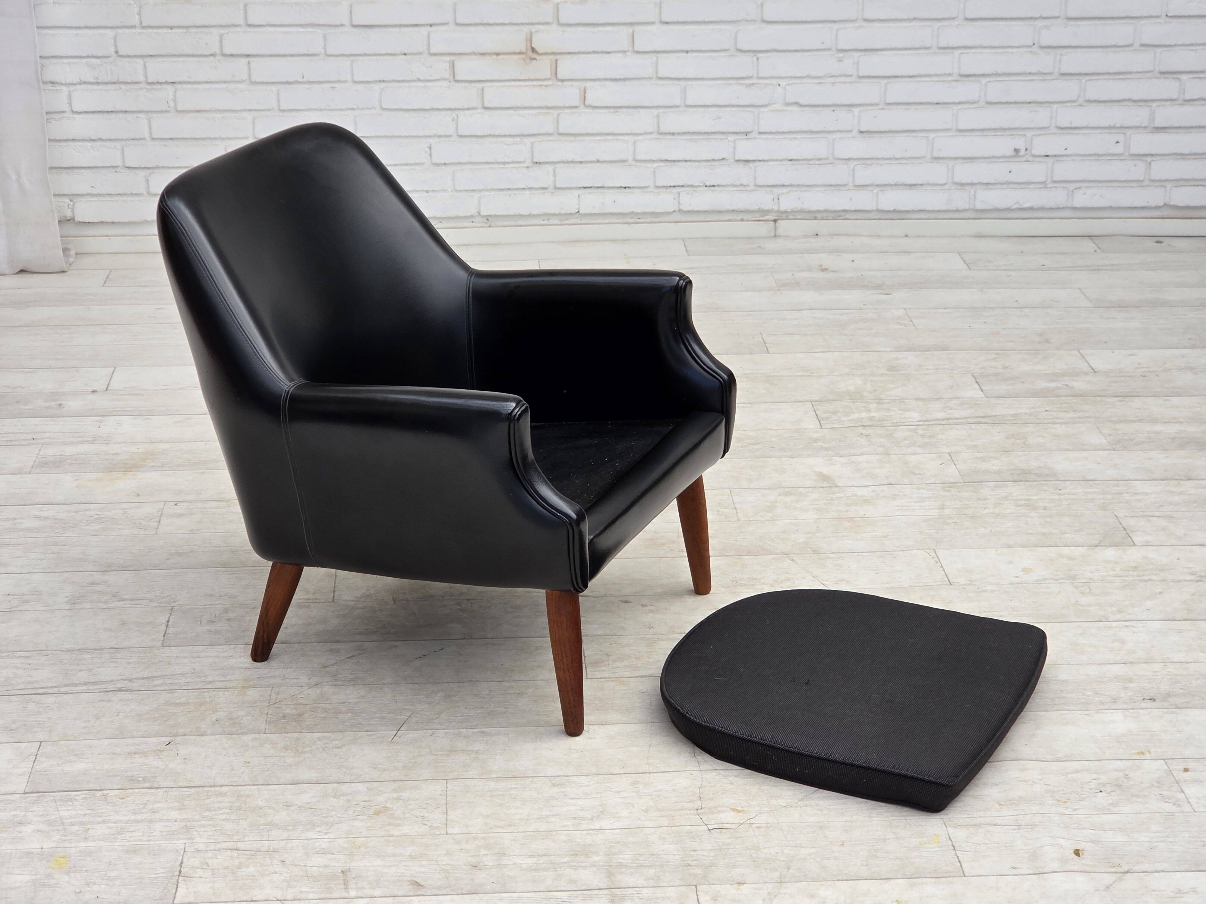 1970s, Danish armchair, artificial leather, teak wood legs.