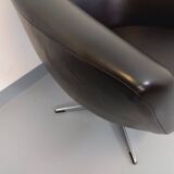 Vintage Scandinavian swivel chair in faux leather and chrome from the 1970s.