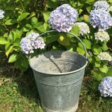 Old bucket in vintage zinc pot cache