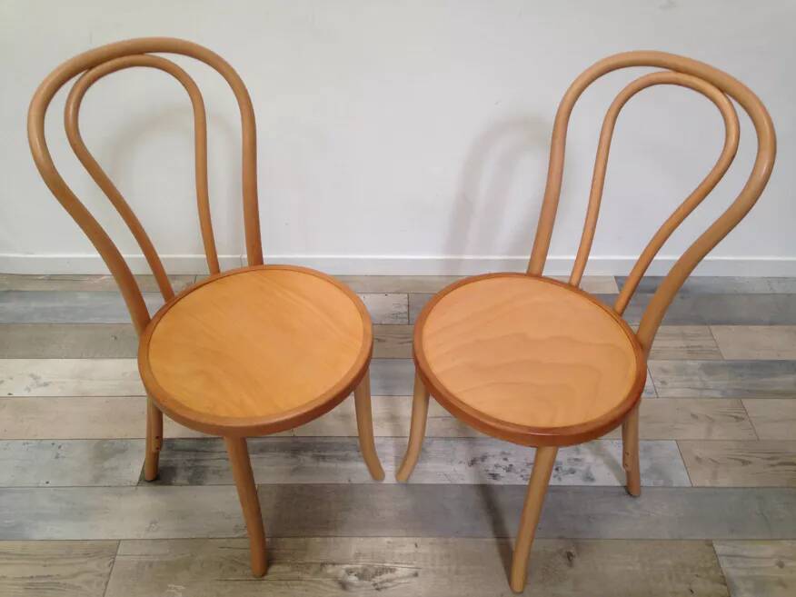 Pair of curved wooden bistro chairs