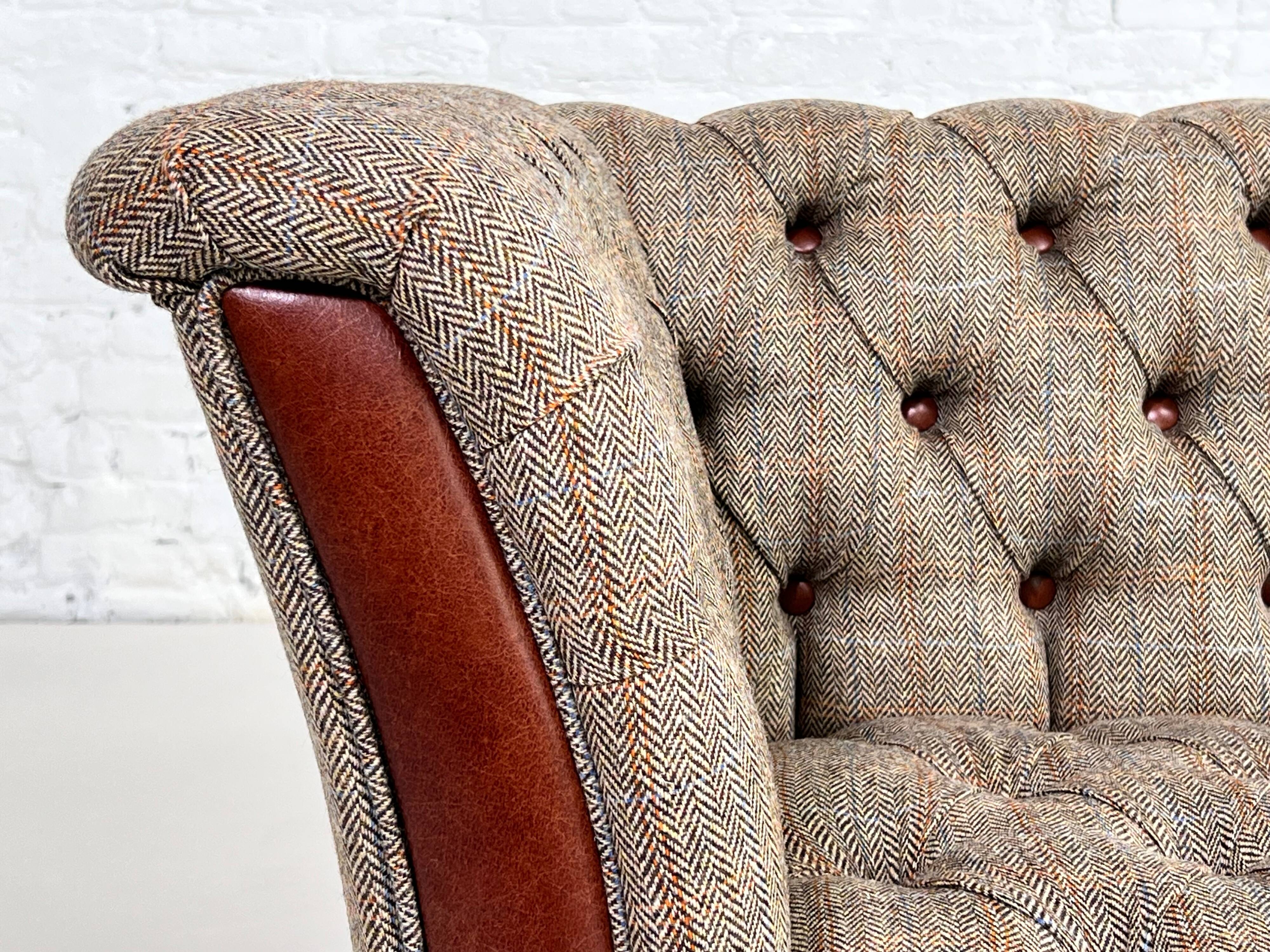 Chesterfield sofa in leather, fabric and wood