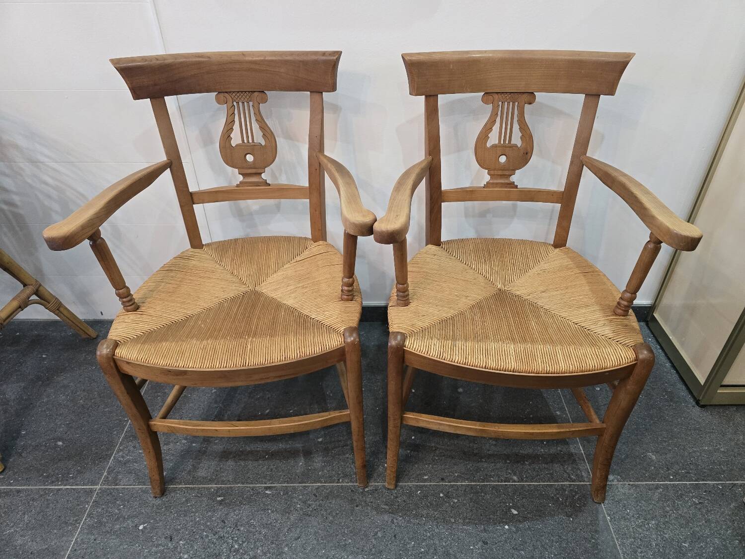 Pair of antique lyre-shaped armchairs – woven straw seats