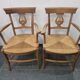 Pair of antique lyre-shaped armchairs – woven straw seats
