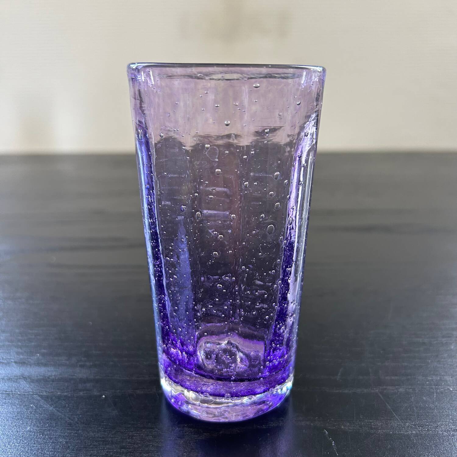 Biot glass in purple glass