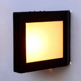 Double-sided patinated triangular wall light