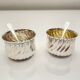 Pair of silver salt cellars and spoons