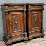 Pair of Renaissance style bedside tables in carved walnut circa 1850