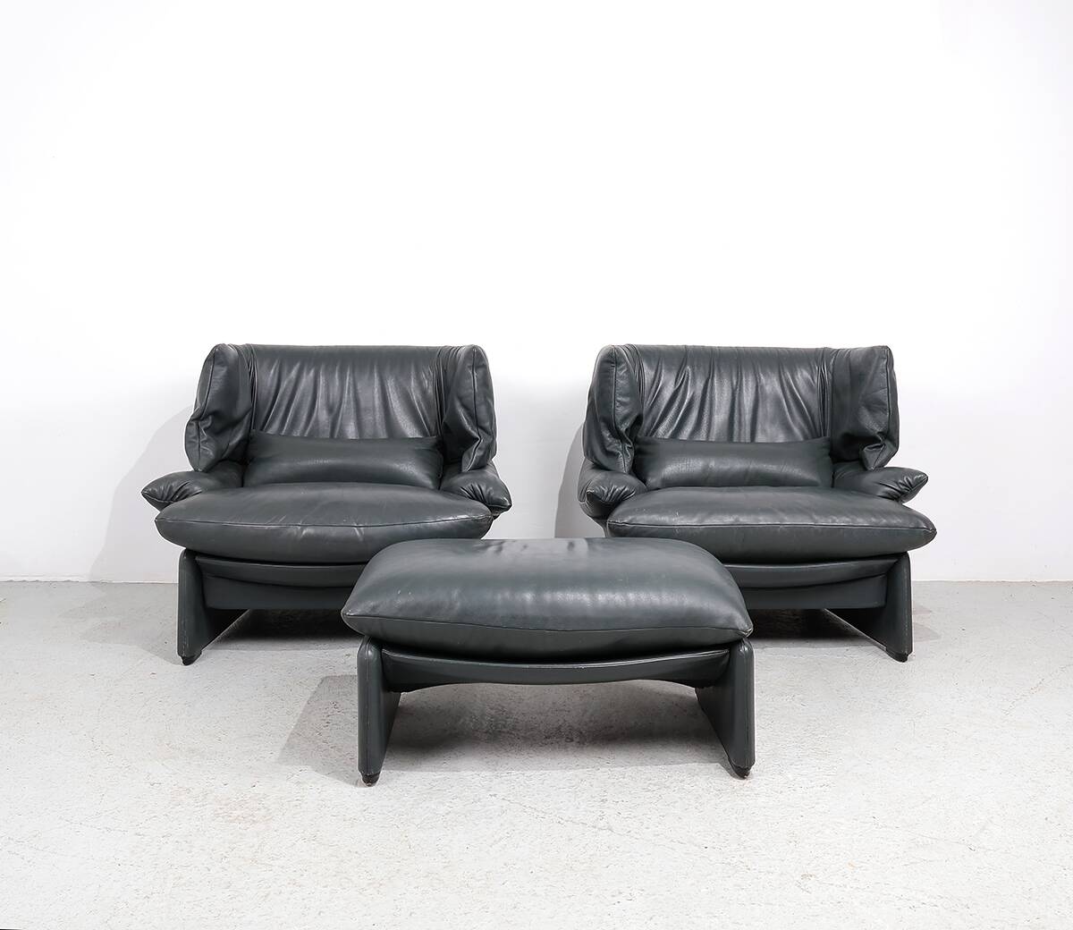Cassina Portovenere set leather lounge chairs with ottoman