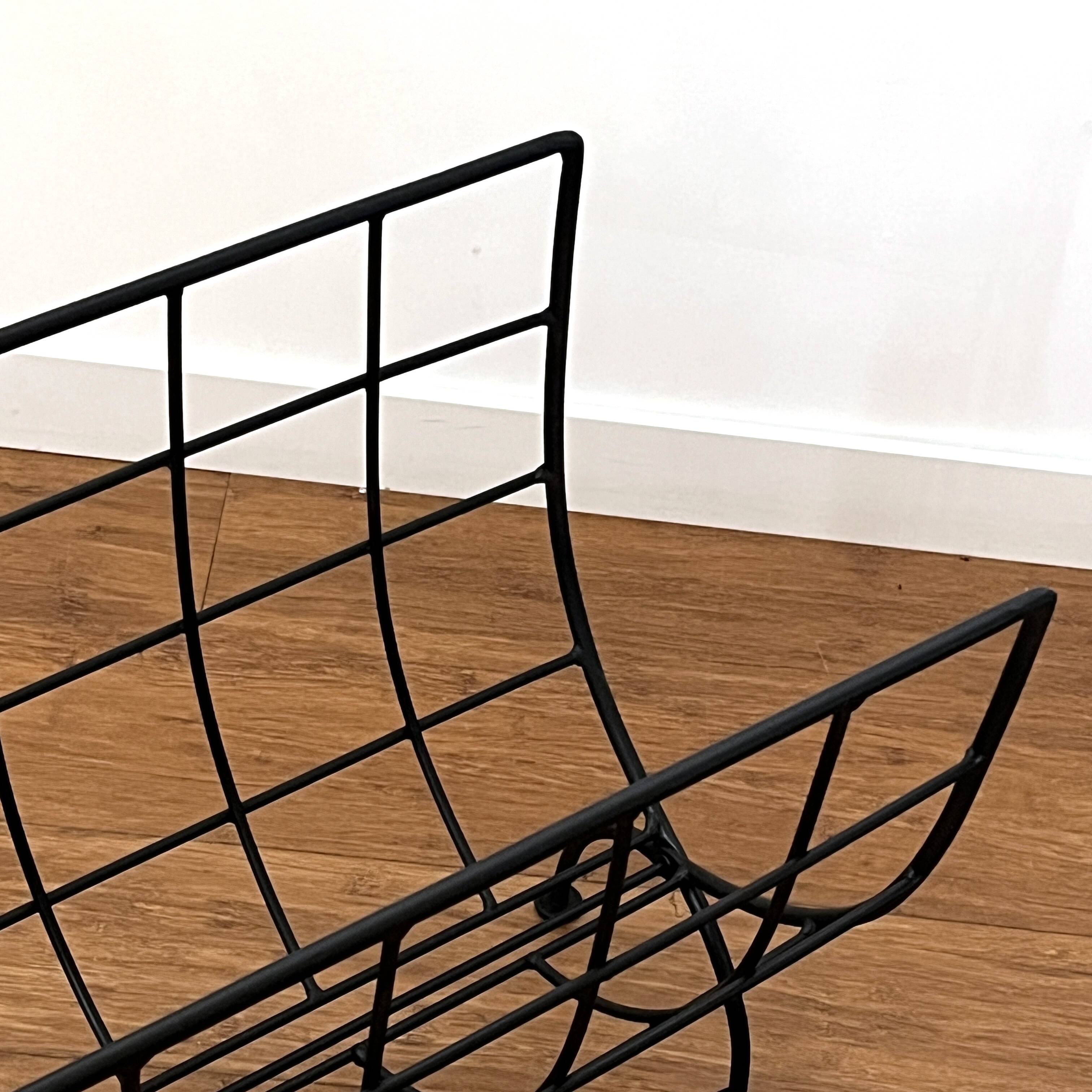 Black metal magazine rack