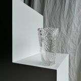 Glass vase with stylized flower pattern
