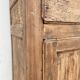 Rustic and vintage wardrobe in raw wood, wabi-sabi style.