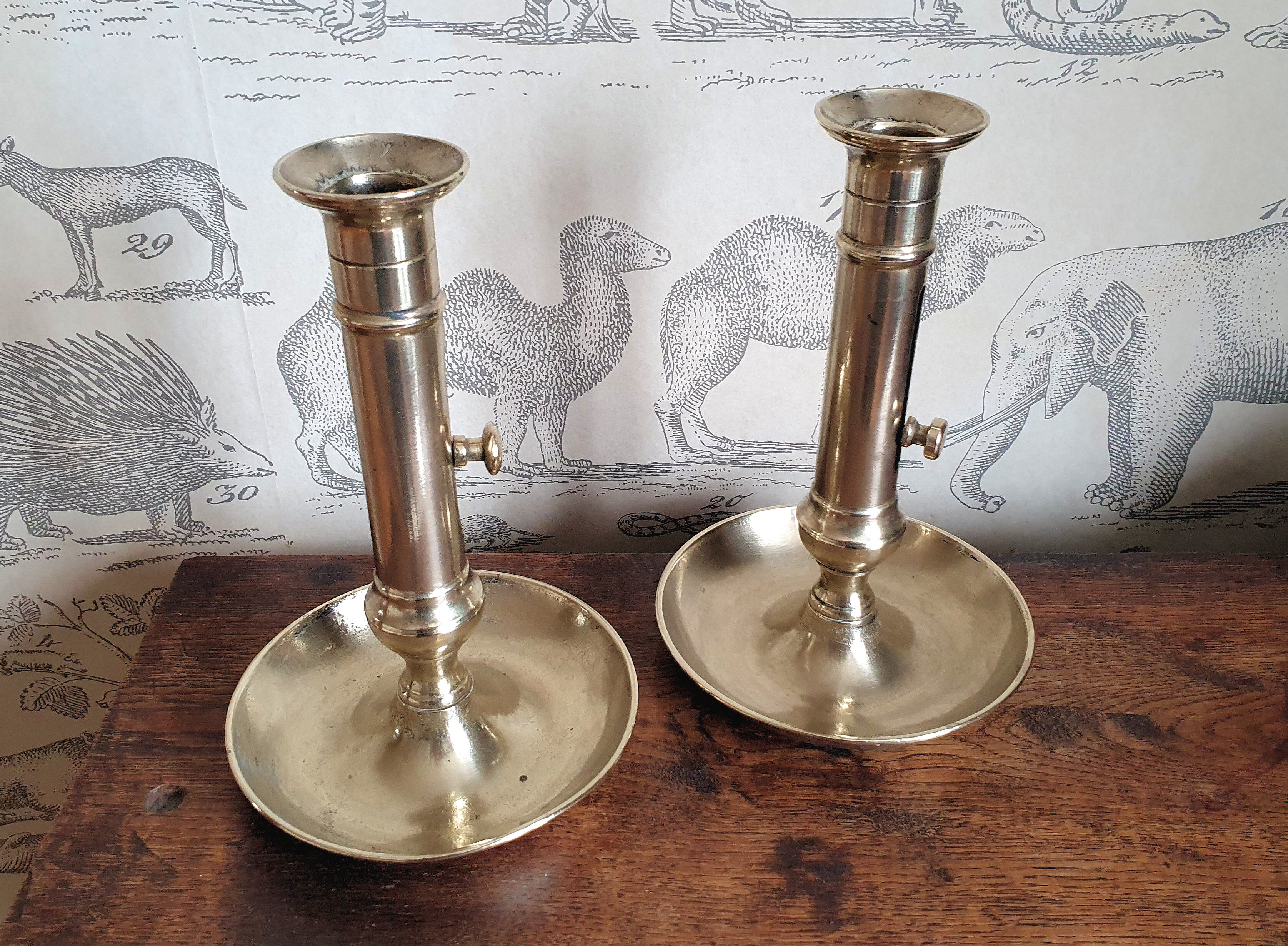 Duo of old brass candle holders