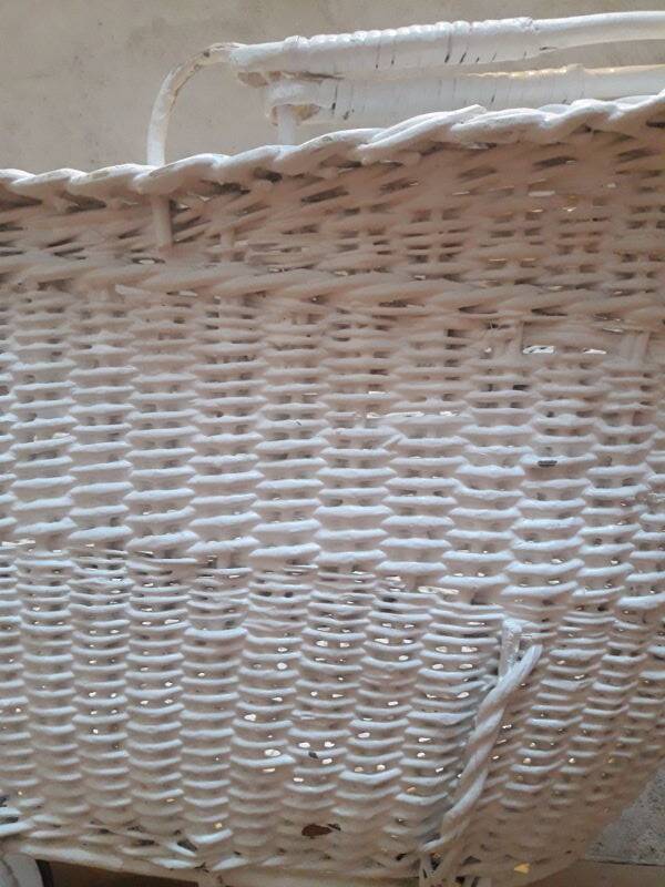 Wicker and painted wood baby cradle