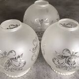 Set of 3 globes with matte glass lampshades and engraved decoration