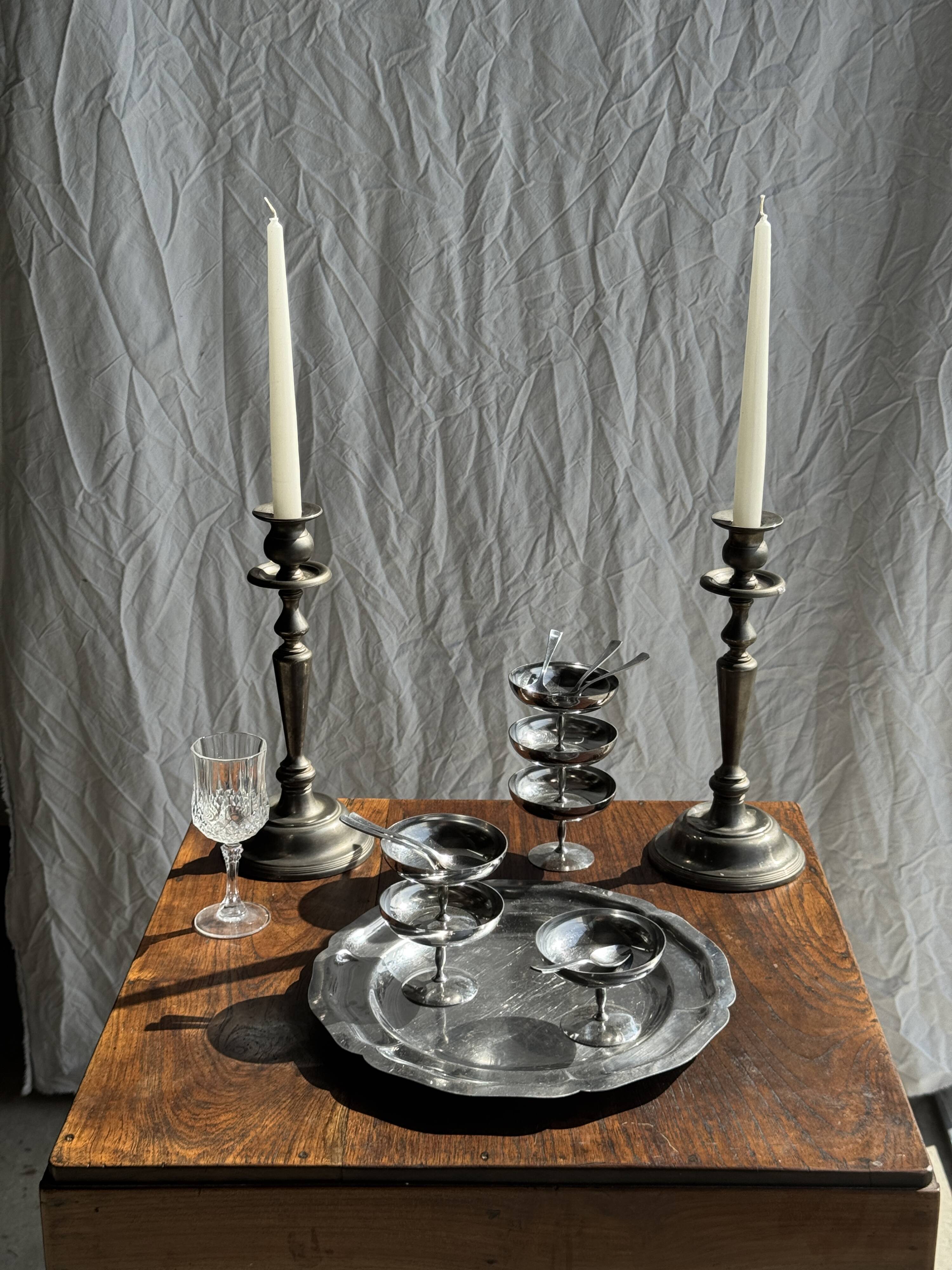Two large antique silver-plated metal candlesticks, H30