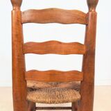 Vintage wooden chair with rush seating