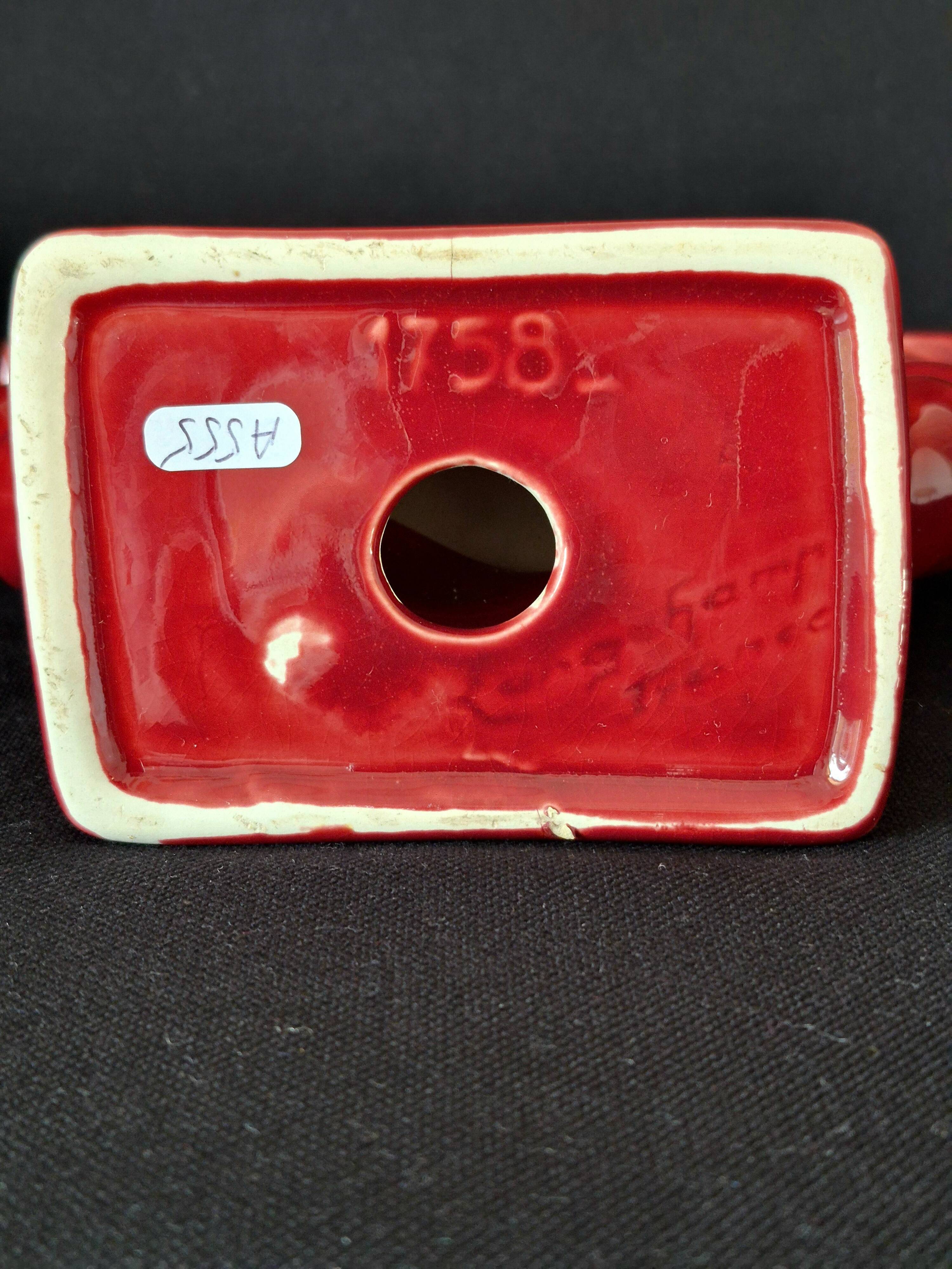 Ceramic chandelier, signed LONGCHAMP, twisted old red