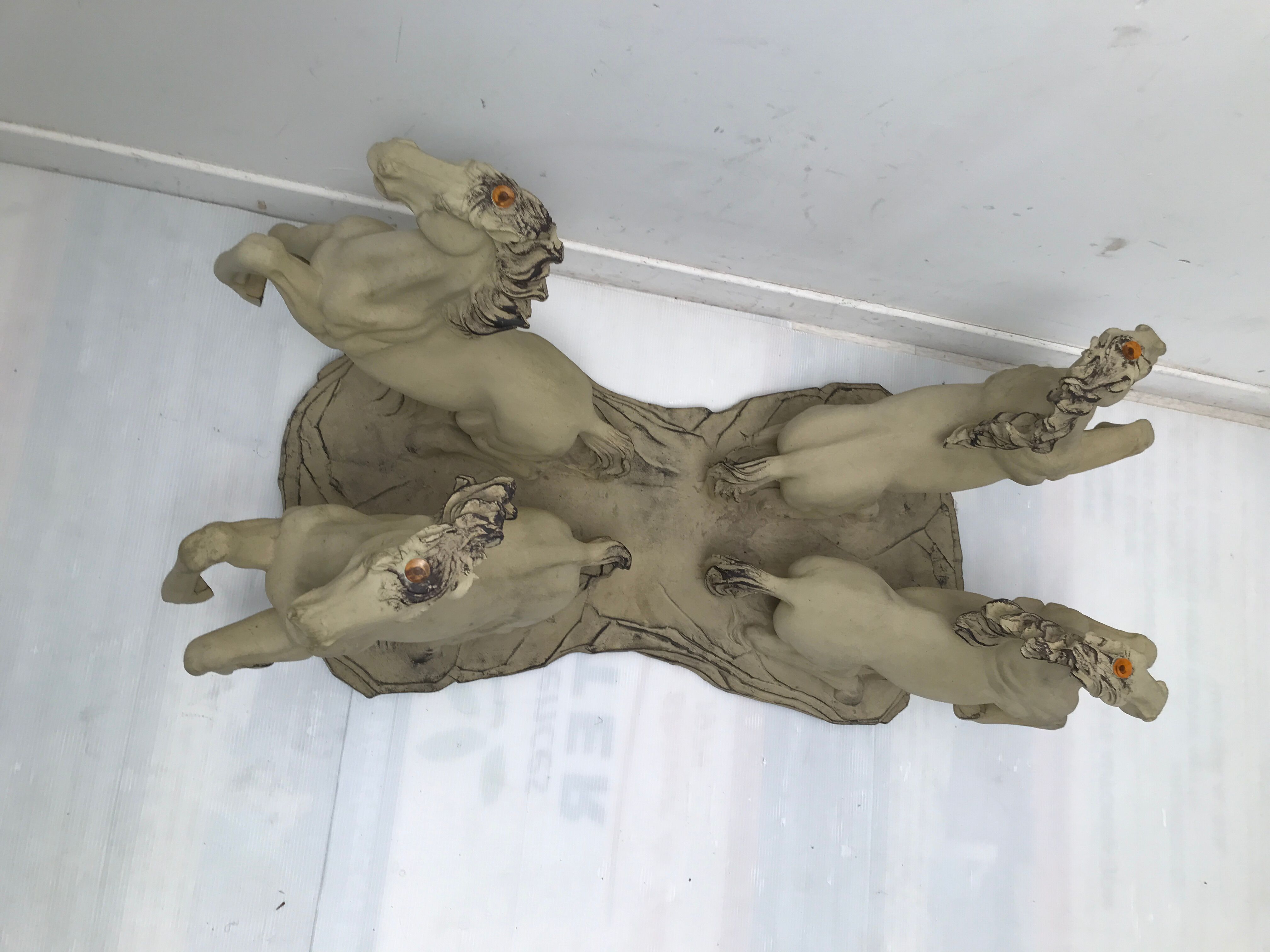 Coffee table glass top on 4 vintage horses
