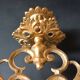 Antique three-light openwork brass church candelabrum.
