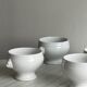 4 bols en porcelaine blanche
