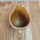 Small antique pressed glass jug in honey colour – moulded decoration