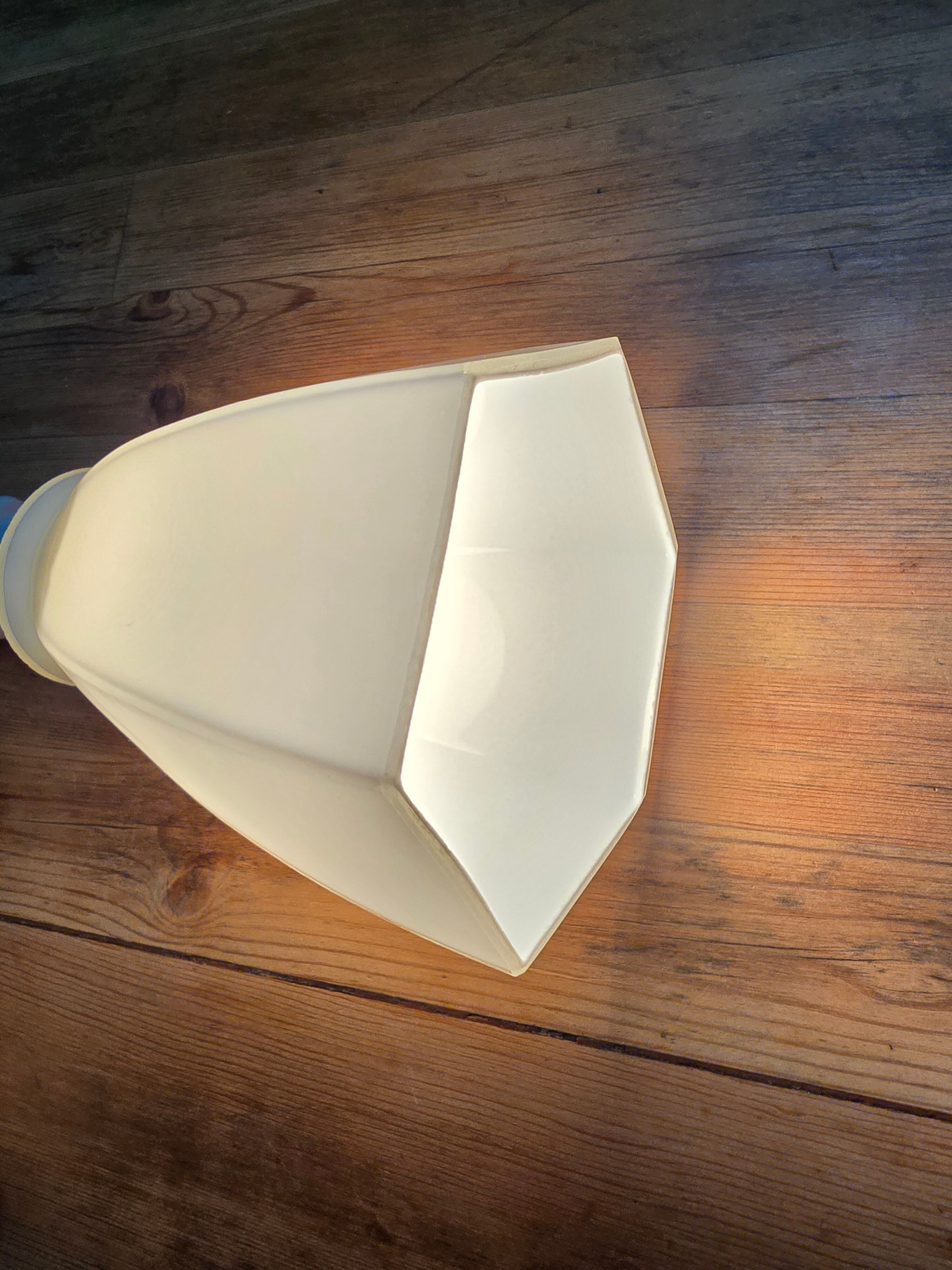 Antique wall light in porcelain with a new socket.