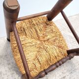 Low chair in turned wood and straw