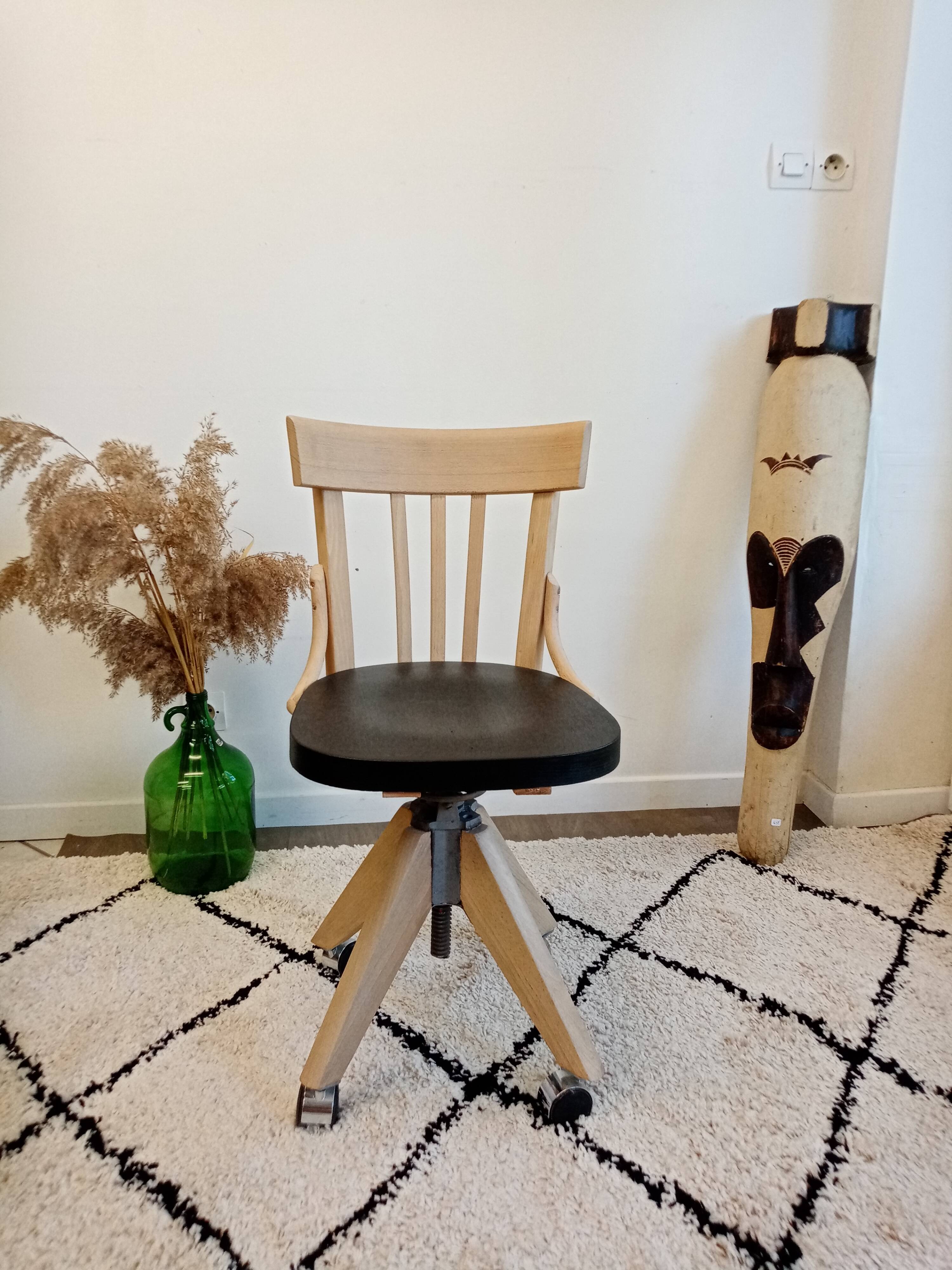 Black and wood workshop chair with metal base