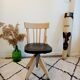Black and wood workshop chair with metal base